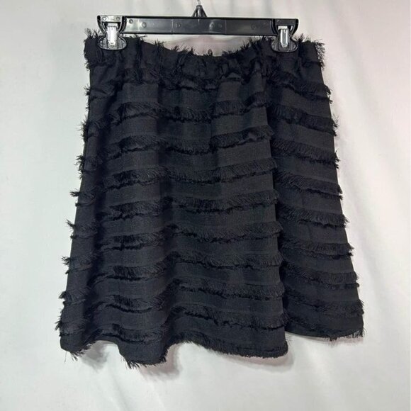 H&M Dresses & Skirts - Woman’s black fringe skirt with pockets. Size 10.